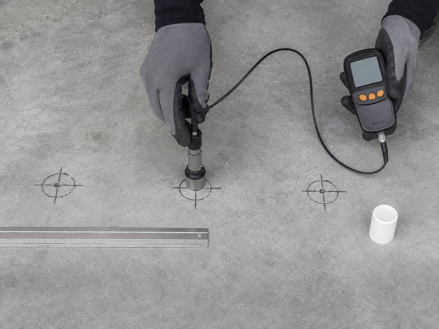 Concrete moisture testing before waterproof resilient flooring installation
